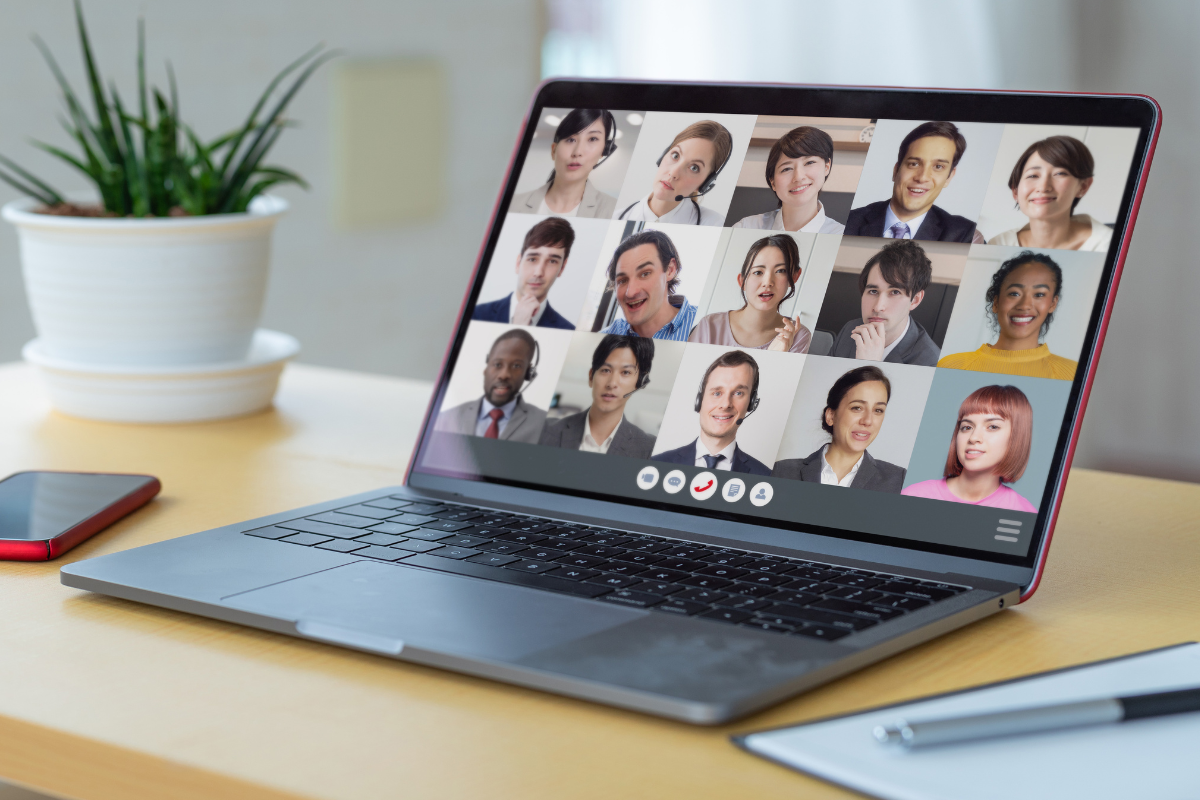 computer screen with 15 faces in zoom grid